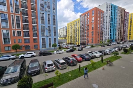 Colourful building facades and parking in the Semytsvit complex in Lviv