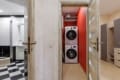 Washing machine and dryer in a separate room of the apartment on Pluhova Street